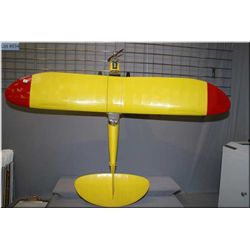 A large handmade gas powered model airplane
