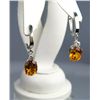 Image 1 : Tantalizing Citrine and Diamond Dangle Earrings with 8.00 carats of fine oval cut citrine accented w