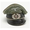 Image 1 : Wehrmacht (Army) Nazi era visor cap in good condition. Evidence of slight crushing from "head or ear