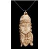 One carved walrus tusk made as a pendant on a rubber necklace. Est.: $50-$100.