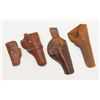 Lot of 4 misc. leather holsters. Est.: $25-$50.