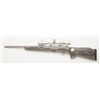 Image 2 : Savage Model 93 rifle in .22 Magnum caliber, stainless finish, composite stock, 3x9 x40 scope marked