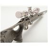 Image 6 : Savage Model 93 rifle in .22 Magnum caliber, stainless finish, composite stock, 3x9 x40 scope marked