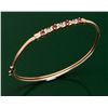 10k gold bangle bracelet with 4 rubies and 3 diamond accents. Est.: $300-$600.