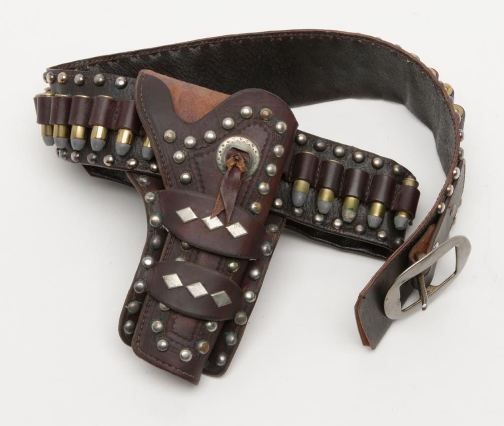 Viking holster rig along with a Western style rig by One-Eyed Jack. Est ...