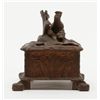 Image 5 : Small black forest style antique carved wooden box with game birds; old damage to front lid edge. Es
