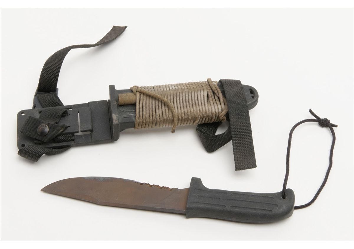 Mission Knives sterile titanium dive knife with rigid sheath, carried