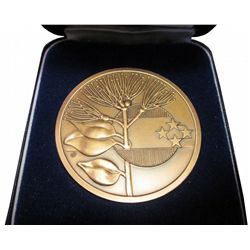 XIVth Commonwealth Games, Auckland, New Zealand, 1990 medal in case of origin, about 2 inches and co
