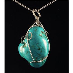 NATURAL 168.75CTW TURQUOISE WIRE WRAPPED PENDANT