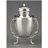 SILVER - An unusual Edwardian ovoid caster, An unusual Edwardian ovoid caster, supported on three...