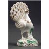 Image 1 : ROCKINGHAM - A rare Rockingham peacock A rare Rockingham peacock, standing with tail fanned, ligh...
