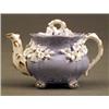 Image 1 : ROCKINGHAM - A miniature Rockingham teapot and cover A miniature Rockingham teapot and cover, the...
