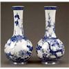 ORIENTAL CERAMICS AND WORKS OF ART - A pair of Chinese blue and white bottle vases A pair of Chin...