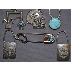 COLLECTION OF SIX KEY CHAINS