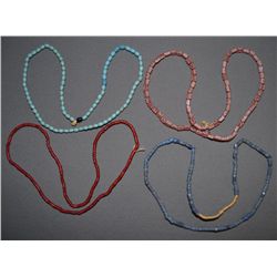 FOUR TRADE BEAD NECKLACES