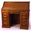 Image 1 : 1920s oak roll top desk, the 'S' tambour front enclosing a fitted interior on a twin pedestal bas…