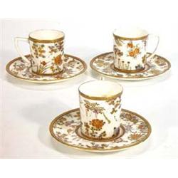 Three Japanese Satsuma coffee cans and saucers, hand painted and gilded with flowers…