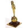 Image 1 : Art Deco brass match striker in the form of a maiden on a sphere, 20cm high…