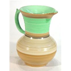 Hand painted Shelley jug decorated with bands of green and brown, 21cm high…