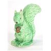 Image 1 : Green glazed Sylvac style seated squirrel clutching an acorn, 12cm high…