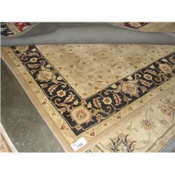 APPROX 8'X10' WOOL PILE AREA RUG - GOLD BLACK AND BROWN FLORAL WITH BEIGE BORDER