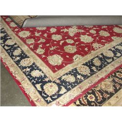 APPROX 8'X9' WOOL PILE AREA RUG - RED BEIGE AND BLUE FLORAL WITH RED BORDER