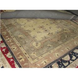 APPROX 6'X9' WOOL PILE AREA RUG - BEIGE AND EARTH TONES FLORAL WITH CHARCOAL BORDER