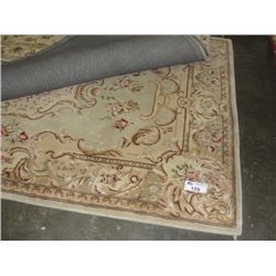 APPROX 8'X5' WOOL PILE AREA RUG - BEIGE BROWN PINK FLORAL WITH BEIGE AND BROWN BORDER