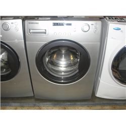 SAMSUNG GREY AND SILVER FRONT LOAD WASHER - STORE RETURNED APPLIANCE