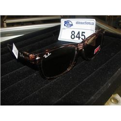 PAIR OF DESIGNER SUNGLASSES -  AMBER AND CLEAR FRAMES - IMMITATION RAYBANS