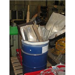BARREL FULL OF ASSORTED SHOVELS