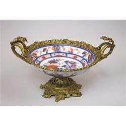 A China bowl in firegilded bronze...