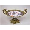 Image 1 : A China bowl in firegilded bronze...