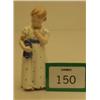 Image 1 : Royal Copenhagen figure of girl with doll, 6" high…