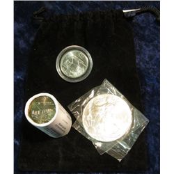 314. Black Felt Bag containing a half roll Iowa State Resident 2004 Quarters plus one encapsulated 2