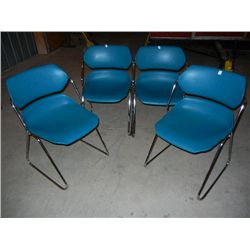 4 Green Plastic Chairs