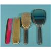 Image 1 : Four-piece silver dressing table set, comprising: a hand mirror, two brushes and a comb …