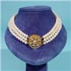 Image 1 : Three strands of cultured pearls with gold filigree clasp, 18 Kt, l. 40 cm.…