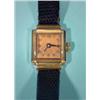 Image 1 : Gold ladies' watch with black leather band, ca. 1940, 18 Kt…