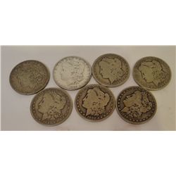 7 Morgan Dollars, 1886-O, 1882-O, 1890-O, 2- 1899-O, 1899-S, 1900-O