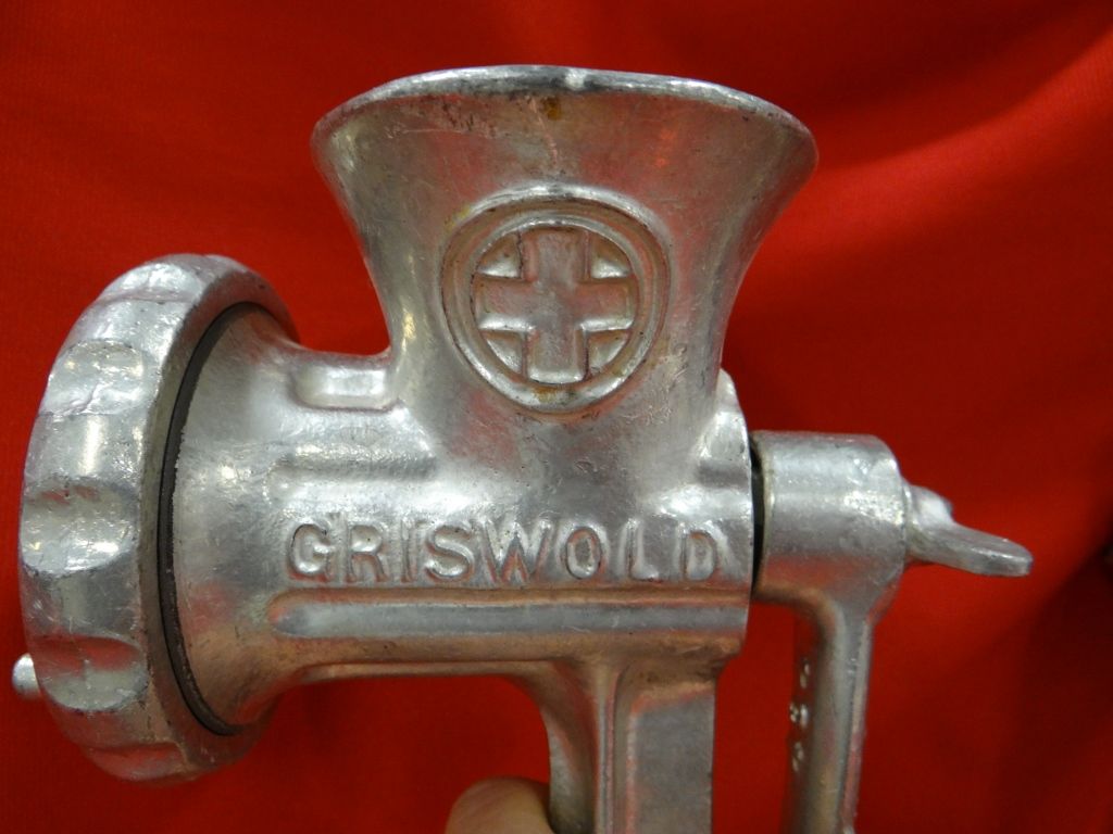 2 Griswold meat grinders, 2, 3, extra blades