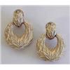 Image 1 : ATTRACTIVE PAIR OF FOURTEEN KARAT YELLOW GOLD EAR CLIPS Each cast with a "leaf" motif. $300/500...