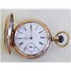 Image 1 : FOURTEEN KARAT YELLOW GOLD HUNTER CASED WATCH The white enamel dial with black Roman numerals and...