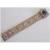 Image 1 : FOURTEEN KARAT YELLOW GOLD BRACELET WATCH The detachable watch case with hinged cover, centered b...