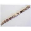 Image 1 : FOURTEEN KARAT YELLOW GOLD SLIDE BRACELET WATCH Centered by a circular watch case with spring loa...
