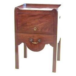 GEORGE III MAHOGANY BEDSIDE CUPBOARD English. Circa 1800. With three quarter gallery above a cupb...
