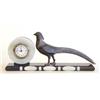 Image 1 : ART DECO MARBLE, ONYX AND PATINATED METAL CLOCK German. Circa 1925. The circular dial with Arabic...