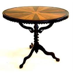 SUPERB REGENCY ANGLO-INDIAN EBONY AND SPECIMEN WOOD SIDE TABLE Circa 1830. The oval top with radi...