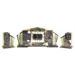 THREE PIECE ART DECO MARBLE AND ONYX CLOCK GARNITURE French. Circa 1930. The green and gray marbl...
