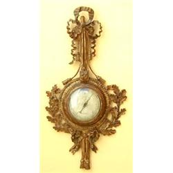 LOUIS XVI STYLE CARVED AND GILTWOOD BAROMETER French. Dated 1845. Dial signed Molgatino. The circ...